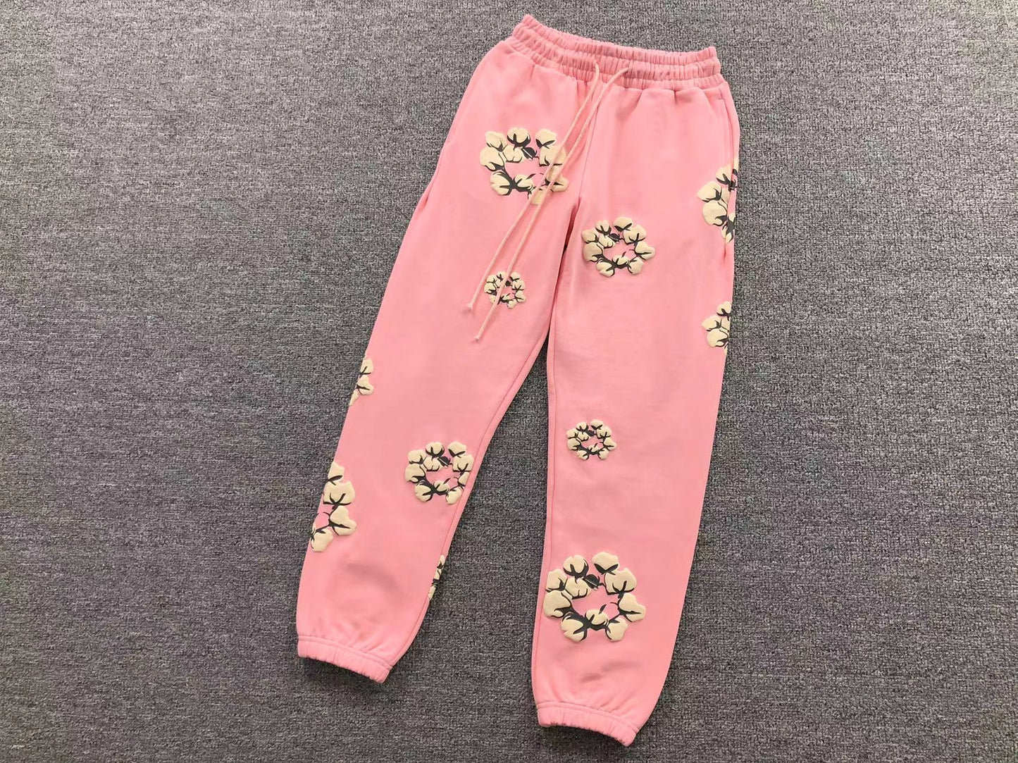 DENIM TEARS CPFM PANTS PINK/WHITE