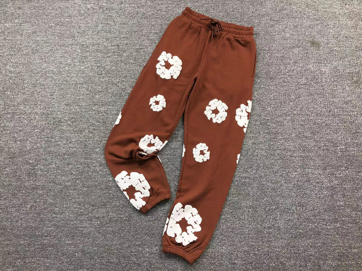 DENIM TEARS PANTS BROWN/WHITE