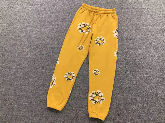 DENIM TEARS CPFM PANTS YELLOW/WHITE